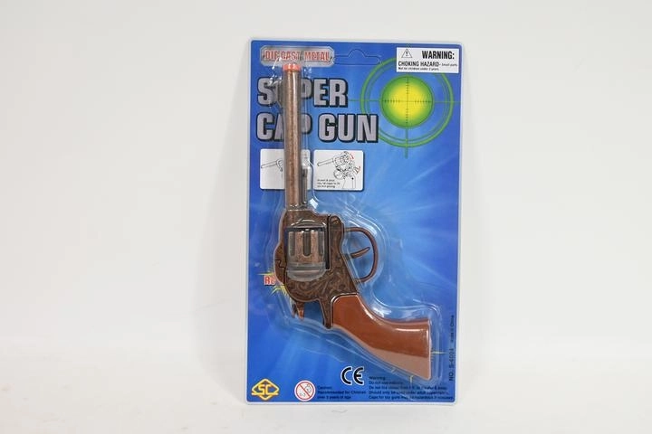 Metalowy pistolet na kapiszony w blistrze