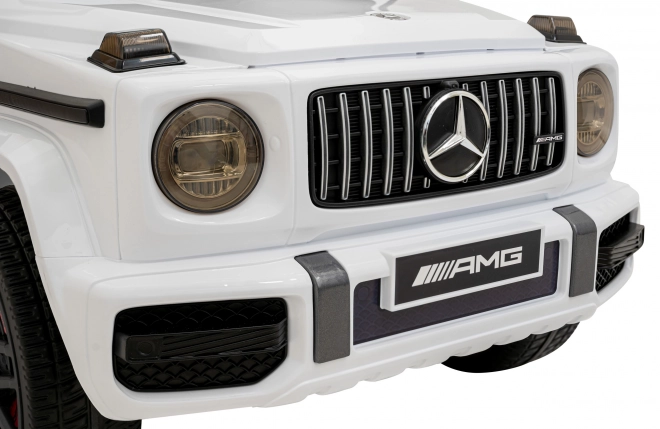 Mercedes AMG G63 dla dzieci biały + zdalne sterowanie + MP3 LED + wolny start + EVA + pasy