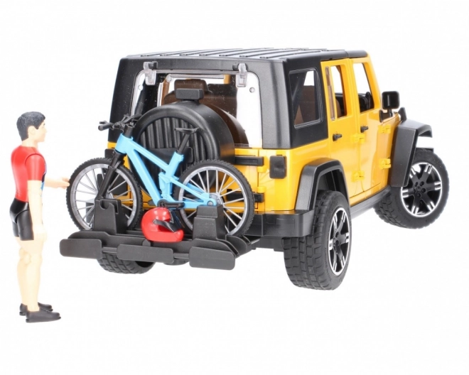 Bruder Jeep Wrangler Rubicon z rowerzystą i rowerem