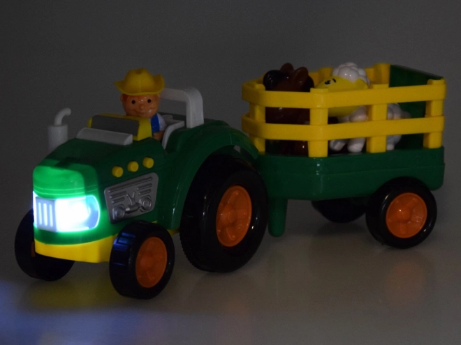 Rolniczy traktor z przyczepą i zwierzętami dźwięk + światło ZA5390