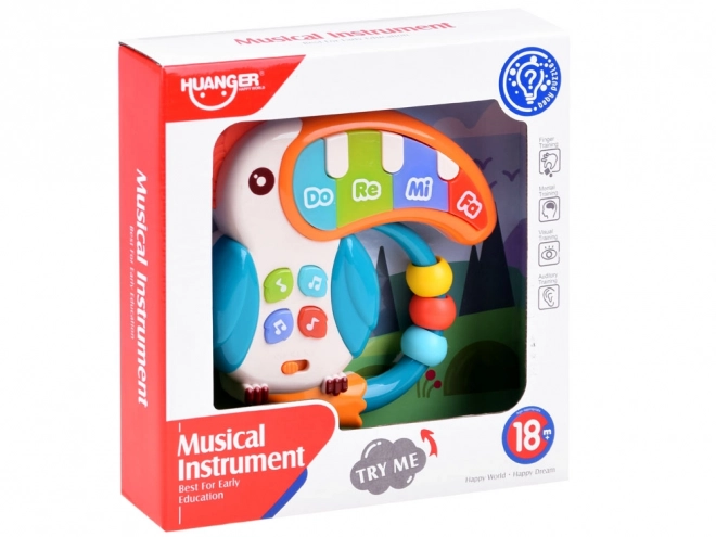 Interaktywna muzyczna zabawka tukan