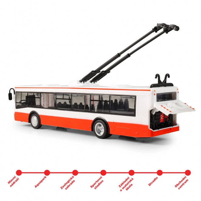 Trolejbus mówiący po czesku plastikowy 29cm czerwony wolny ruch na bat. ze światłami z dźwiękiem w opak. 33x11x10cm