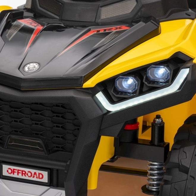 Żółty sportowy dziecięcy quad TX ATV