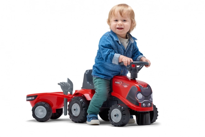 Jeżdżący traktor Baby Case IH czerwony z przyczepą
