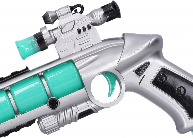 Pistolet kosmiczny z efektami i projekcją 22 cm