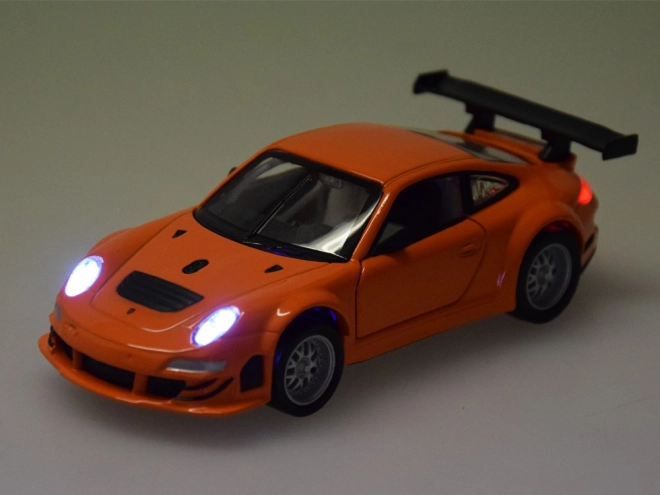 Metalowy model Porsche 911 GT3 RSR 1:32 ze światłem i dźwiękiem
