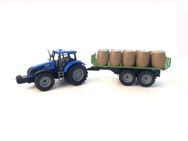 Traktor z mechanizmem bezwładnościowym i przyczepą pełną siana