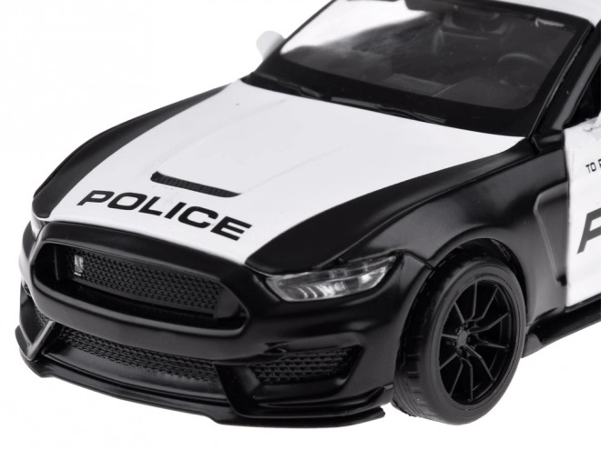 Metalowe policyjne auto Ford Shelby GT350 w skali 1:32 z efektami świetlnymi sygnałów