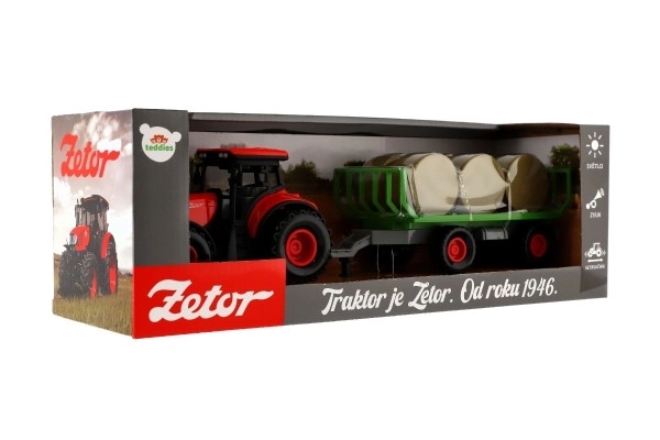 Traktor Zetor z przyczepą i belami plastikowymi 36cm na mechanizm inercyjny na bat. z światłem i dźwiękiem w opak. 39x13