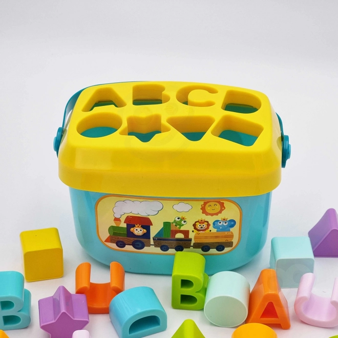Sorter dziecięcy Woopie i walizka z nauką alfabetu i kształtów