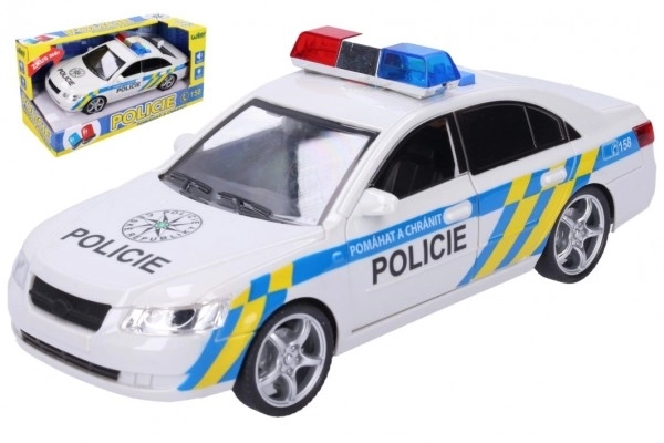 Samochód policyjny plastikowy 24 cm na baterie z dźwiękiem i światłem w pudełku 28x14,5x12 cm