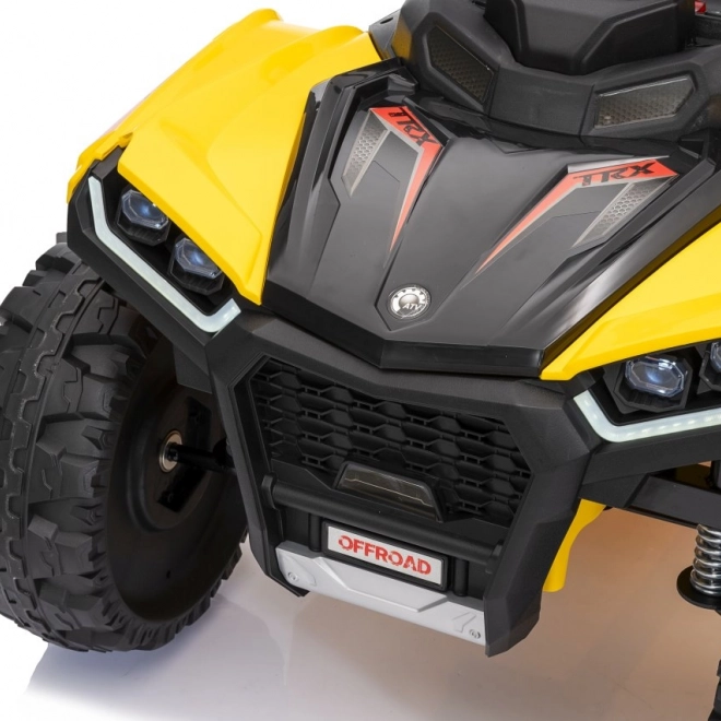 Żółty sportowy dziecięcy quad TX ATV