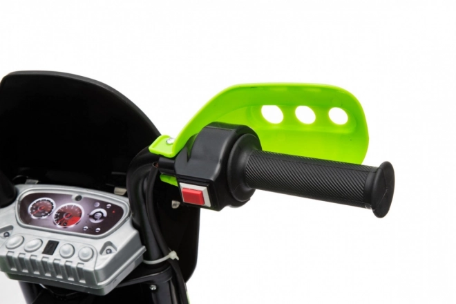 Dziecięcy elektryczny motocykl cross na akumulator – zielony, z kółkami pomocniczymi i światłami LED