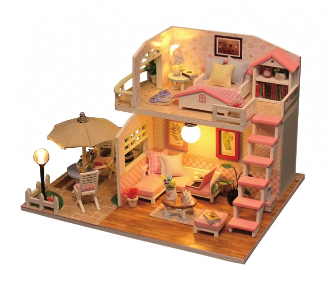 Dwujęzyczny miniaturowy domek Różowy dom