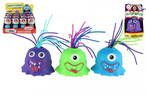 Potworek/Monstrum z przyssawką plastik 7cm na baterie ze dźwiękiem, światłem 3 kolory w pudełku 12szt w kartonie