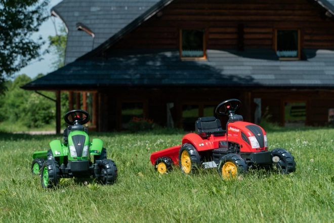 Pedałowy traktor z przyczepą czerwony