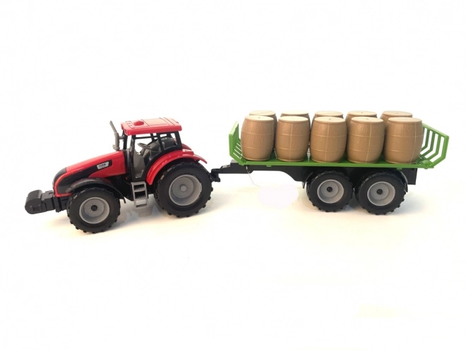 Traktor z mechanizmem bezwładnościowym i przyczepą pełną siana