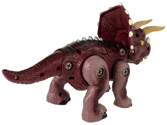 Plastowy dinozaur do skręcania z wiertarką