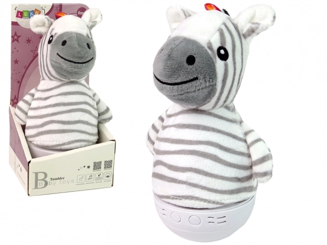 Dziecięca huśtawka zebra z lampką i melodią