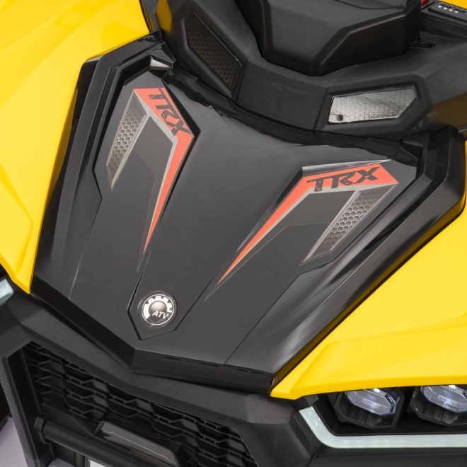 Żółty sportowy dziecięcy quad TX ATV