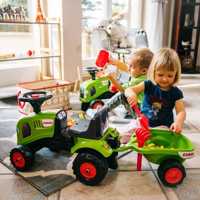 Jeździk traktor Claas zielony z kierownicą i przyczepą
