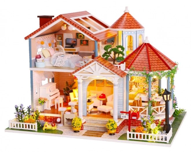 Dziewięć miniatur domków Dom kolorowej glazury