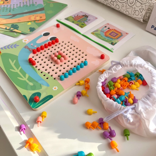 Drewniana układanka z kołeczkami od Tooky Toy