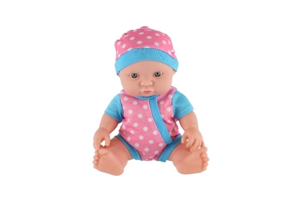 Lalka/miminko solidne ciało plastik 25 cm na baterie z dźwiękiem 3 rodzaje w plastikowej torebce 13x28x7cm