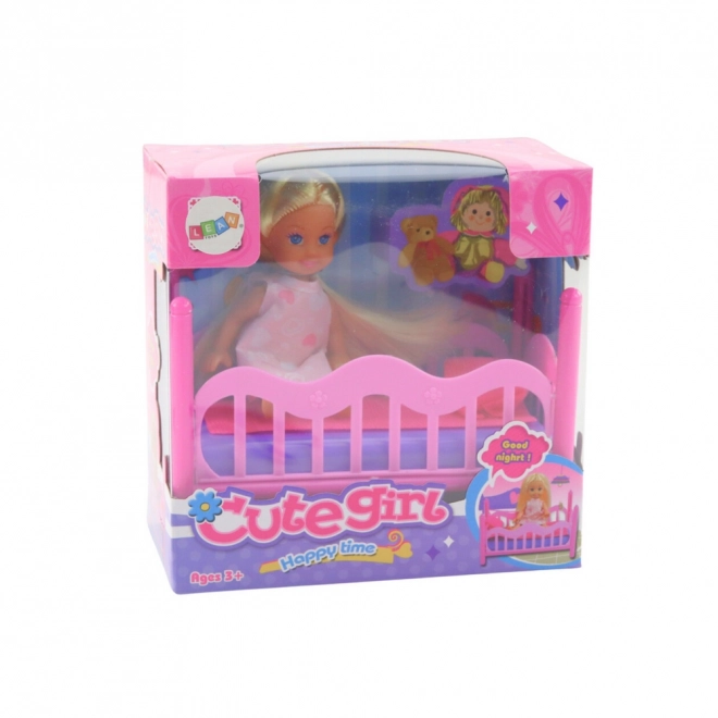Zestaw mini lalka w piżamie różowe łóżeczko