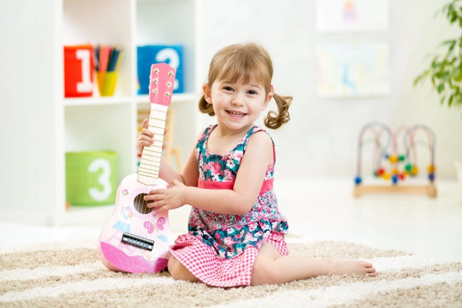 Dziecięca drewniana gitara, metalowe struny, różowa ECOTOYS