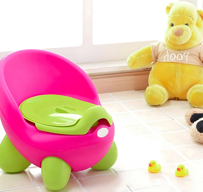 Dziecięcy nocnik ECOTOYS różowo-zielony z antypoślizgowymi nogami