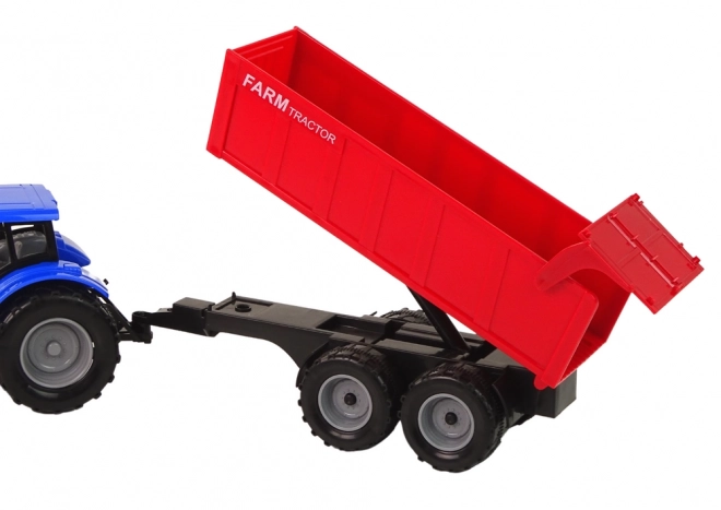 Interaktywny traktor z przyczepą - niebieski