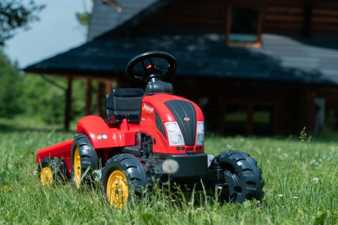 Pedałowy traktor z przyczepą czerwony