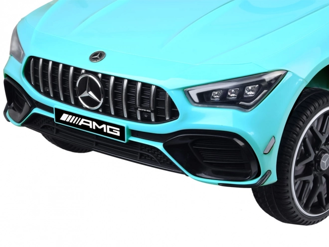 Dziecięcy samochód elektryczny Mercedes AMG CLA 45s z efektem bujania – Niebieski