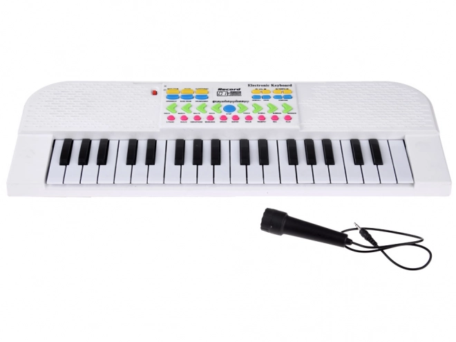 Dziecięcy mini instrument klawiszowy z mikrofonem
