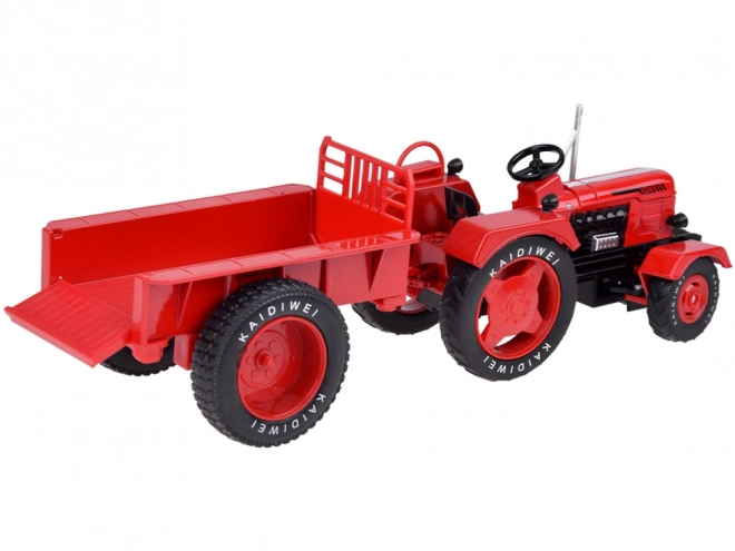 Czerwony metalowy traktor z gumowymi kółkami 1:18