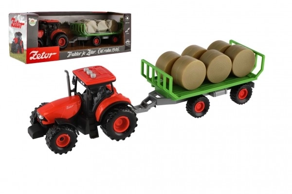 Traktor Zetor z przyczepą i belami plastikowymi 36cm na mechanizm inercyjny na bat. z światłem i dźwiękiem w opak. 39x13