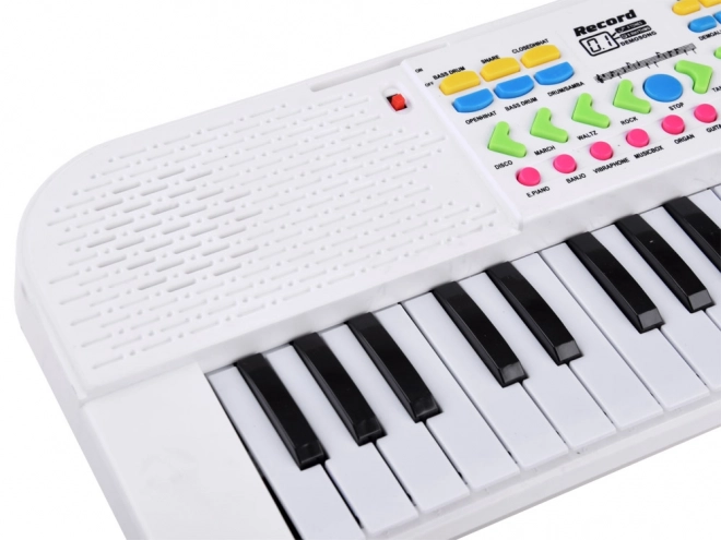 Dziecięcy mini instrument klawiszowy z mikrofonem