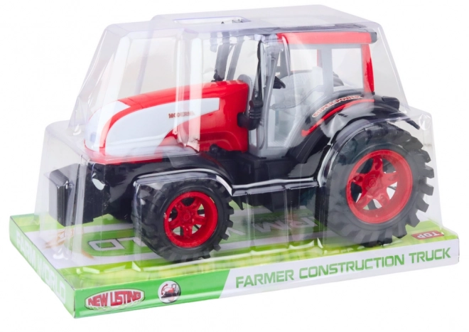 Duży rolniczy traktor z napędem Czerwony