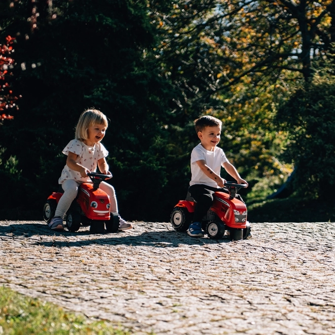 Odpychacz traktor Massey Ferguson czerwony z kierownicą i wa