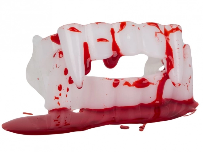 Zestaw sztucznych zębów i krwi na Halloween