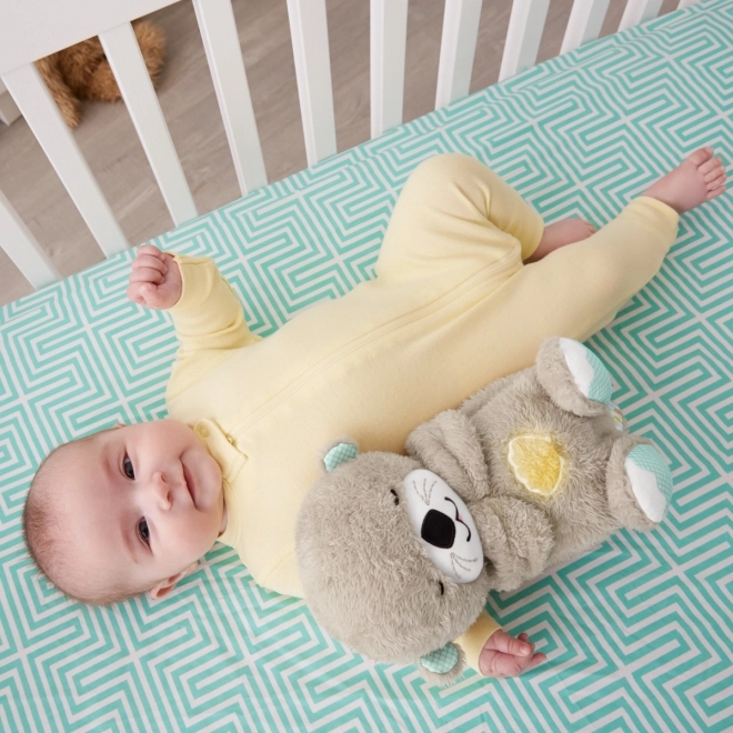 Fisher-Price Kojąca wydra z melodiami FXC66