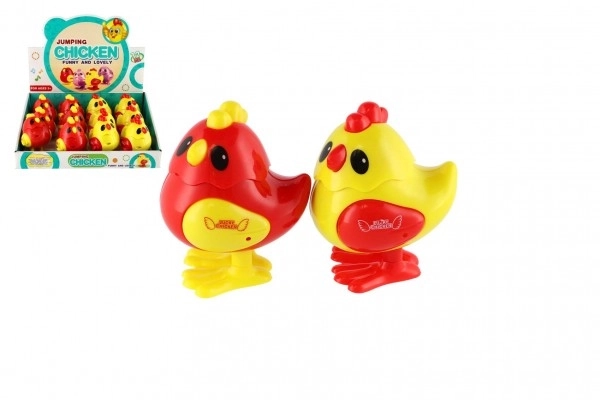 Kurczątko do nakręcania plastik 7x9cm 2 kolory 12szt w pudełku