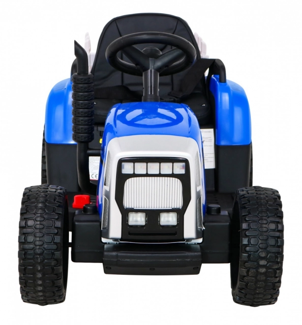 Dziecięcy traktor z przyczepą niebieski