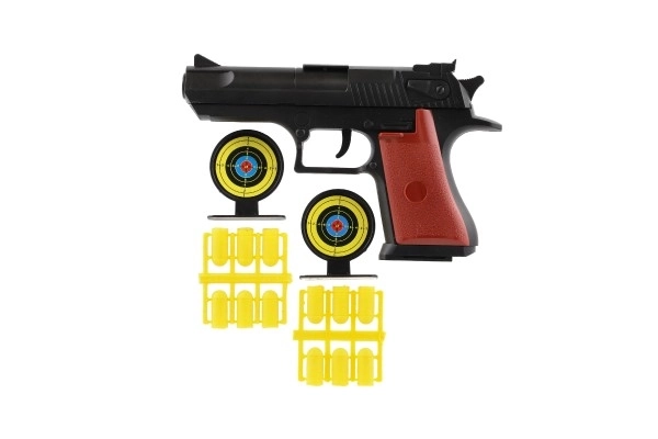 Pistolet na korki 17cm plastik + naboje 12szt + tarcza 2szt na karcie