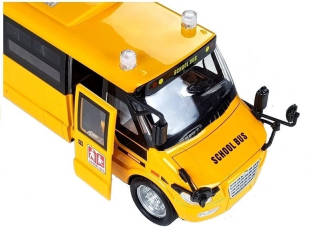 Metalowy szkolny autobus z napędem naciągowym