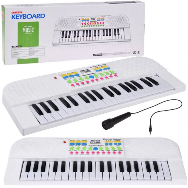Dziecięcy mini instrument klawiszowy z mikrofonem