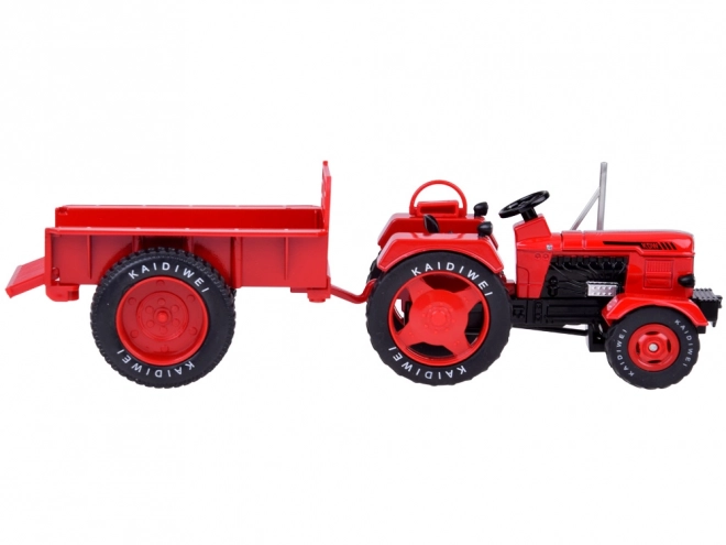 Czerwony metalowy traktor z gumowymi kółkami 1:18