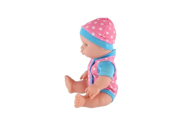 Lalka/miminko solidne ciało plastik 25 cm na baterie z dźwiękiem 3 rodzaje w plastikowej torebce 13x28x7cm