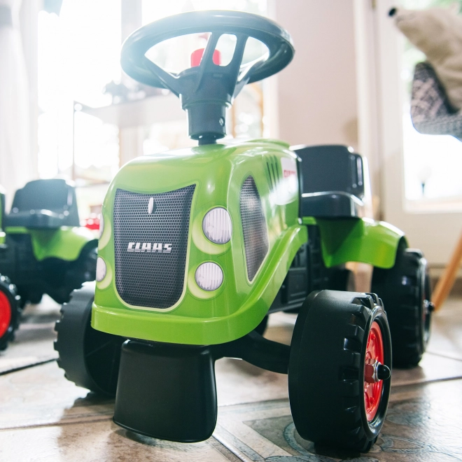 Jeździk traktor Claas zielony z kierownicą i przyczepą